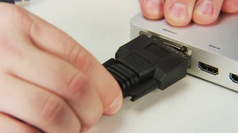 Plugging Black Cable to a Slot Stock Footage 70997256