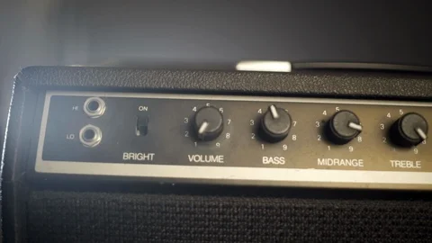 Plugging a cable into an Amp Stock Footage 112196445