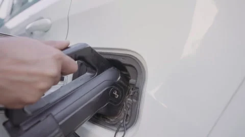 Plugging the Charger Stock Footage 283759709