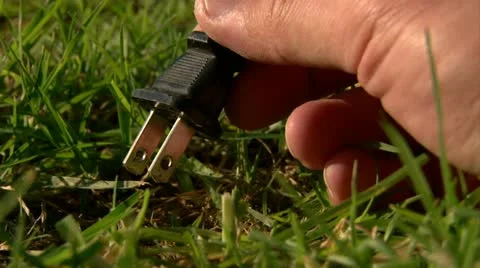 Plugging into earth Stock Footage 20511236