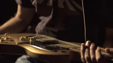 Plugging in electic guitar 4k Stock-Footage 70148674