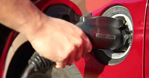 Plugging in Electric Car Stock Footage 57677533