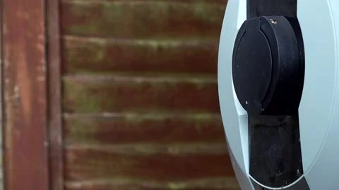 Plugging in an electric car Stock Footage 131538374