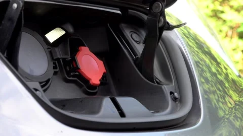 Plugging in an electric car Stock Footage 131539325