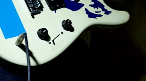 Plugging into an electric guitar Stock Footage 46832729