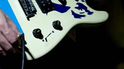 Plugging into an electric guitar Stock Footage 46832815