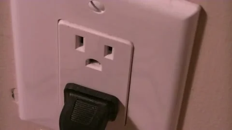 Plugging in an Electrical Cord Stock Footage 11689607
