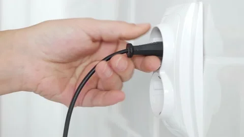 Plugging Electrical Cord in Wall European Socket, Plug in Devices, Electric Stock Footage 238913377