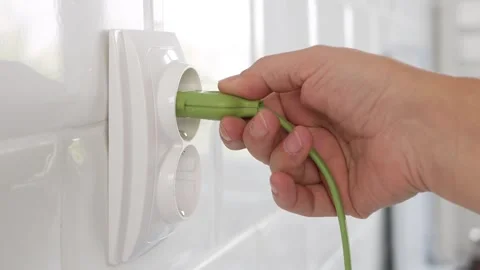 Plugging Electrical Cord in Wall European Socket, Plug in Devices, Electric Stock Footage 250384920