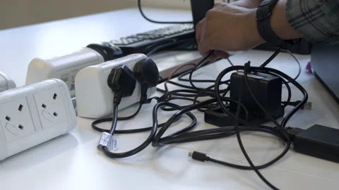 Plugging Electronic Devices Into Electricity Plug Socket And Attaching USB Stock Footage 200682383