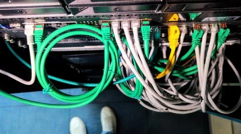 Plugging in ethernet cables Stock Photos