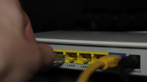Plugging Ethernet into Router 動画素材 47297113