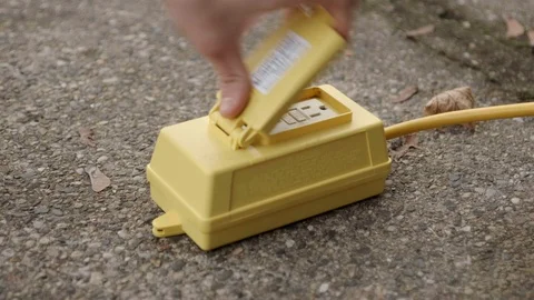 Plugging in Extension Cord Stock Footage 85637769