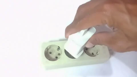 Plugging in Stock Footage 283047805