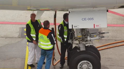Plugging in ground power for aircraft Stock Footage 45999027