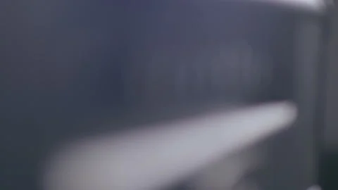 Plugging guitar cable jack into amplifier Stock Footage 100360557