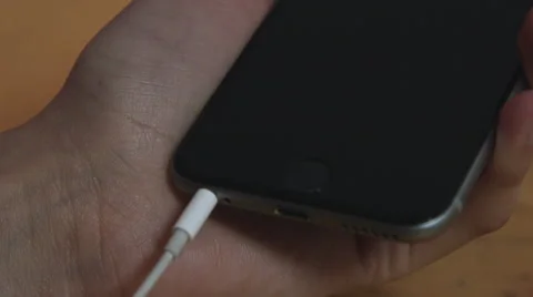 Plugging in Headphones Stock-Footage 59842957