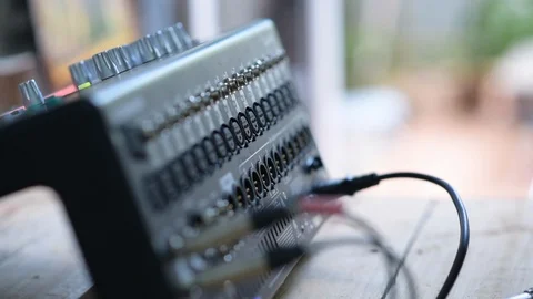 Plugging in a jack audio to Sound Mixer Stock Footage 97545408