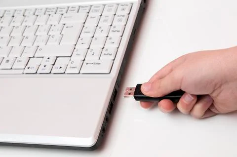 Plugging the laptop Stock Photos