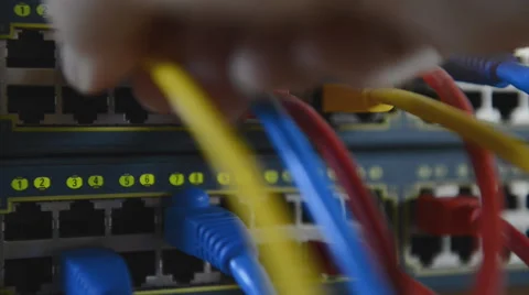 Plugging patchcord in a node Stock Footage 43721601