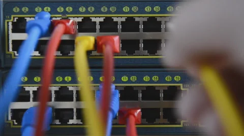 Plugging patchcord in a node Stock Footage 43723657