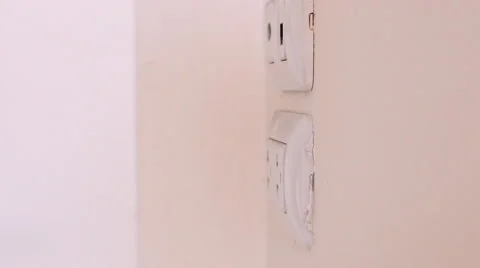 Plugging a power adapter Stock Footage 56090537