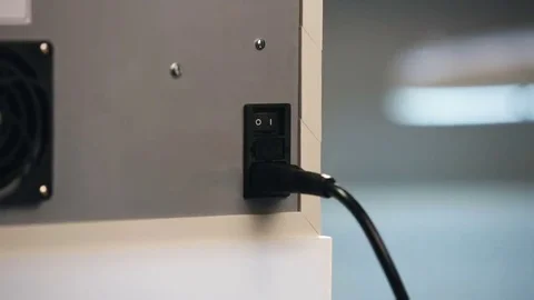 Plugging in power cable Stock Footage 69165350