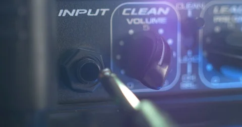 Plugging Quarter Inch Cable Stock Footage 89597861