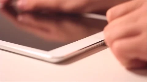 Plugging &amp; Unplugging iPad Charging Stock-Footage 43937677