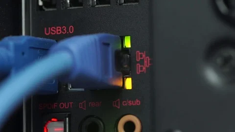Plugging USB and LAN cable into Computer Stock Footage 71542169
