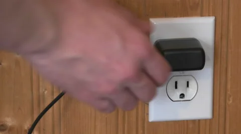 Plugging USB Charger into Power Outlet. Stock Footage 62413820