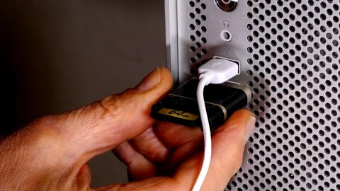 Plugging in USB devices to a computer. Stock Footage 88947329