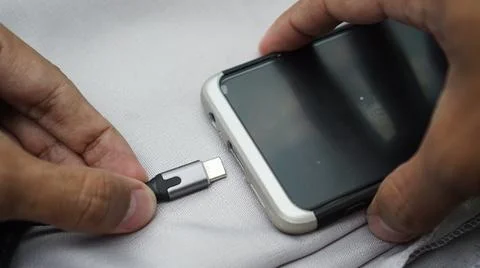 Plugging in USB type C port to Phone 스톡 사진