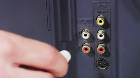 Plugging White and Red Cables to Slots Stock Footage