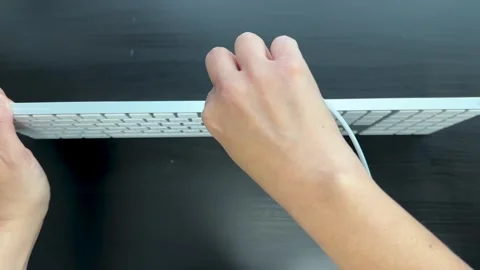 Plugging In a Wired Numeric Keypad Keyboard on Desk Stock Footage 318517645