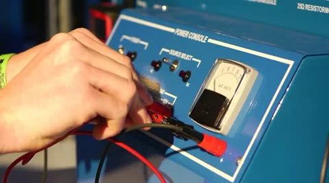 Plugging in Wires-Voltage Video stock 21251580