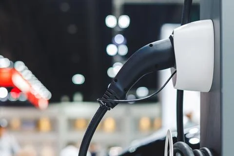 Plugin EV charging for electric car green power sustainable energy source z.. Stock Photos
