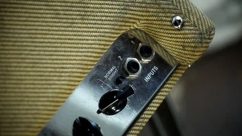 Pluging guitar into amp Stock Footage 101987530