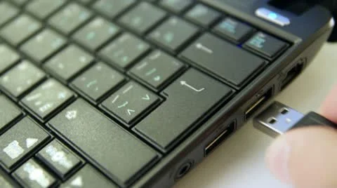 Pluging USB Cable In Laptop  Full HD Stock Footage 10687140