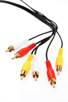 Plugs and cables on plain background Stock Photos