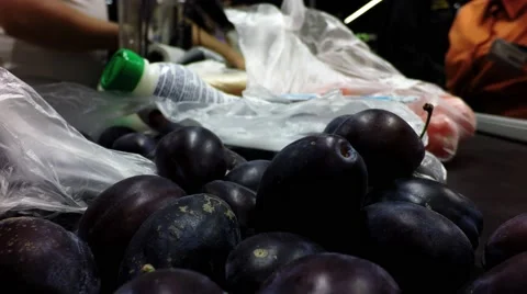 Plum buying in a store Stock Footage 67486546