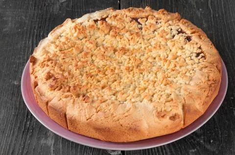 Plum cake on the plate Stock Photos