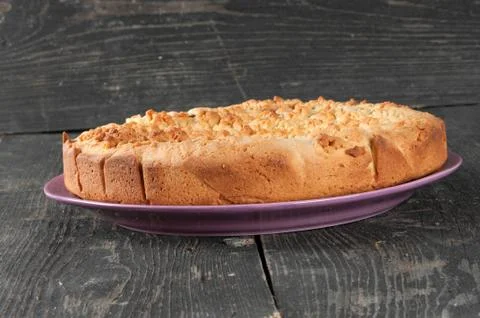 Plum cake on the plate Stock Photos