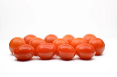 Plum cherry tomatoes Stock Photos