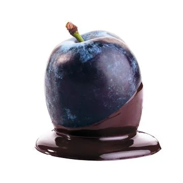 Plum in chocolate Stock Photos