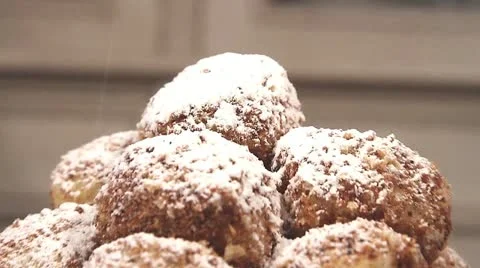 Plum dumplings dusted with icing sugar Stock Footage 24673350