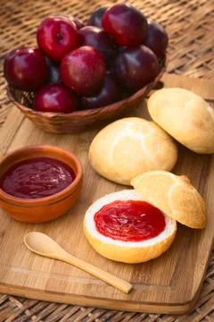 Plum Jam on Bun Stock Photos