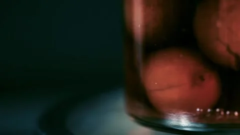 Plum jam in glass jar macro close-up rotating 4K Stock Footage 252029188