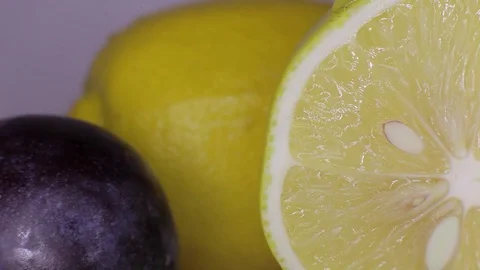 Plum, lemon and drop of water  Stock Footage 81211856