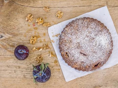 Plum pie with walnuts Stock Photos